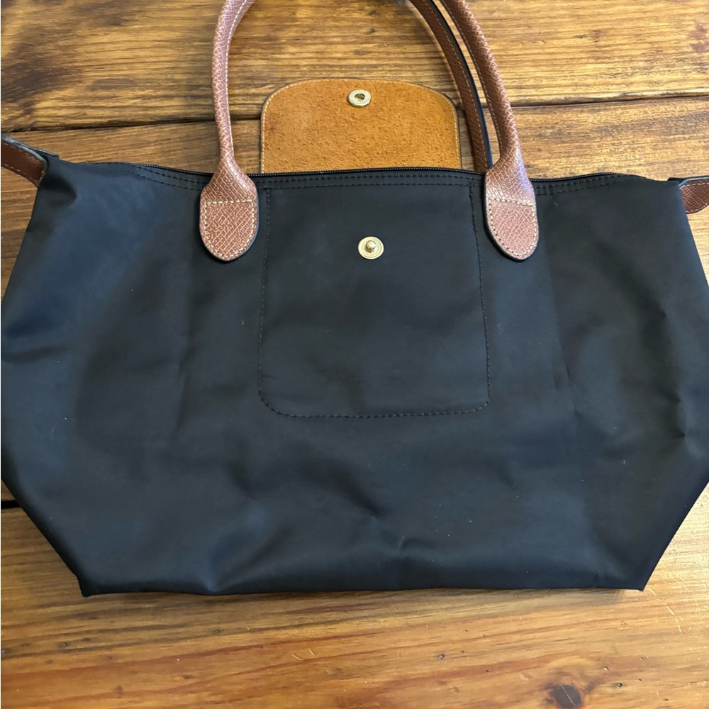 Longchamp Elegant Black Tote with Tan Handles